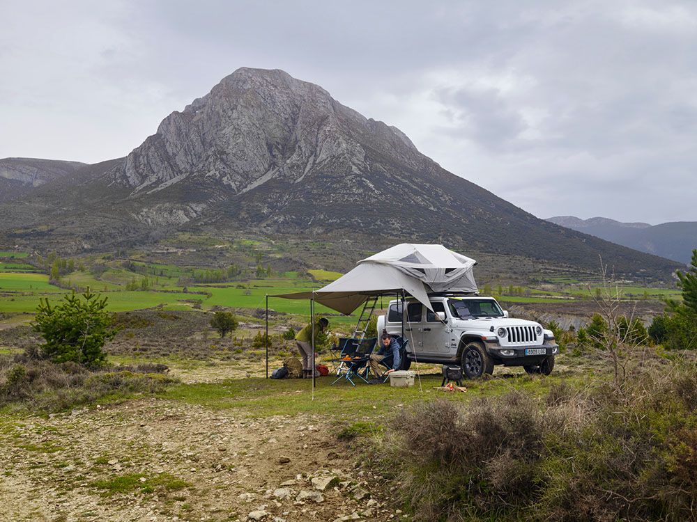 A Jeep with a rooftop tent