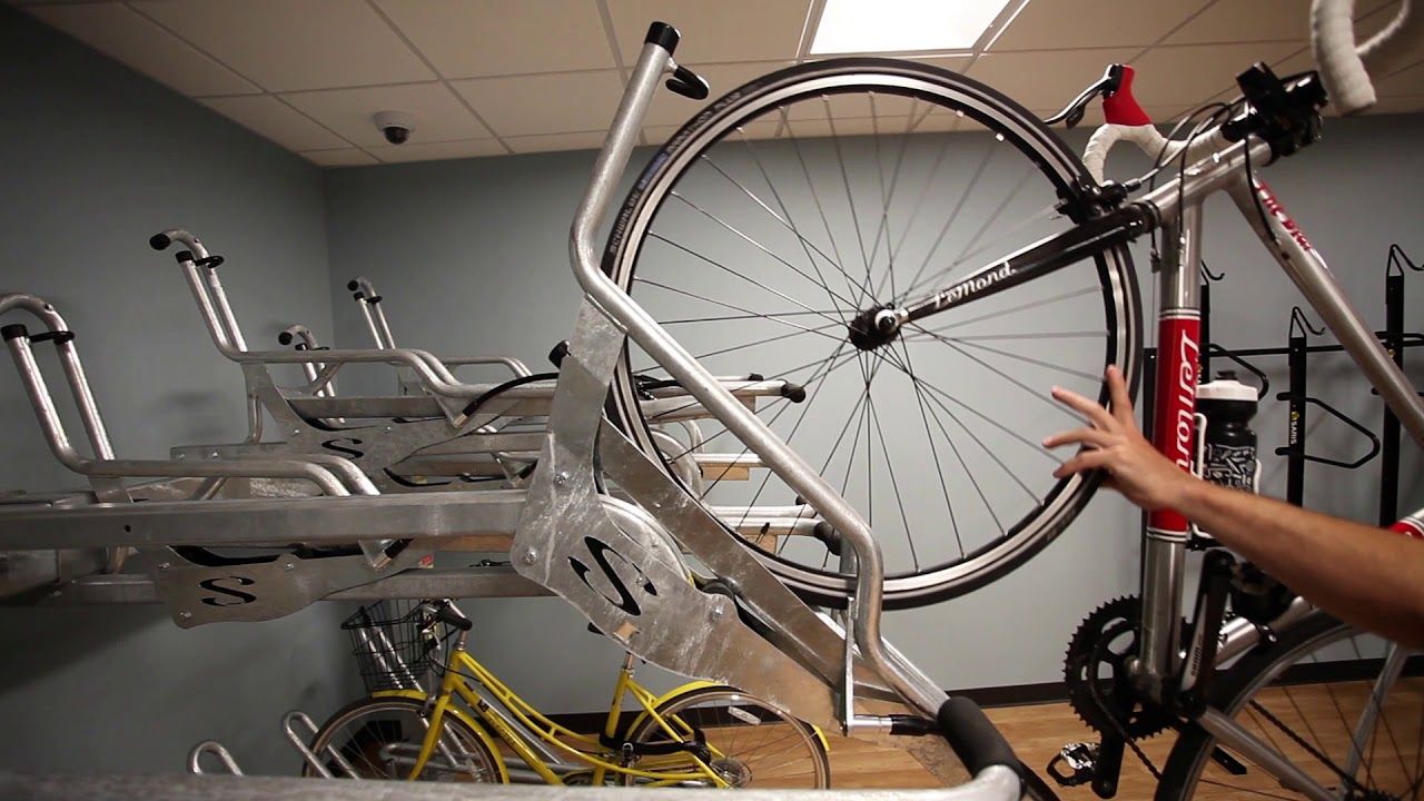 bike storage room with custom lift-assist bike storage racks