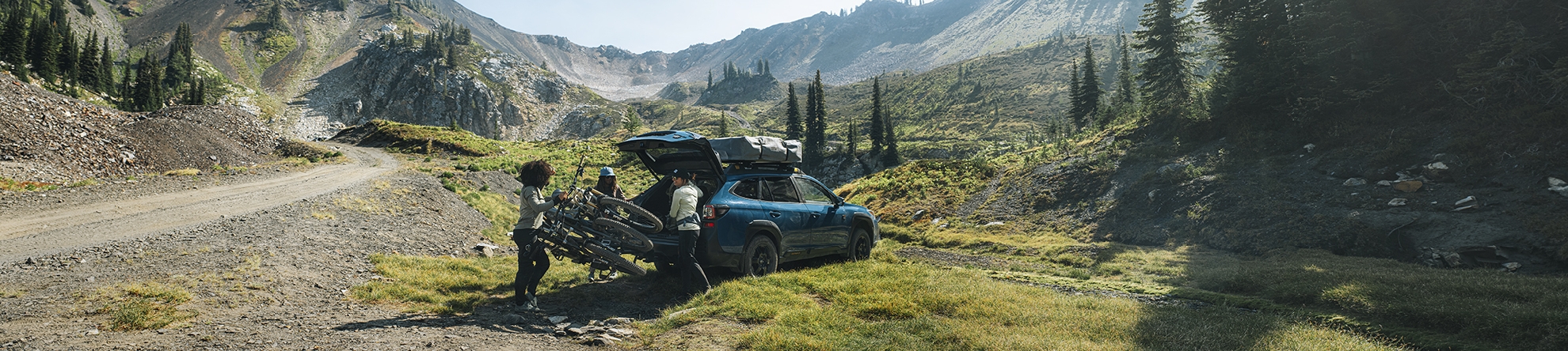 A car with bikes on a mountain road