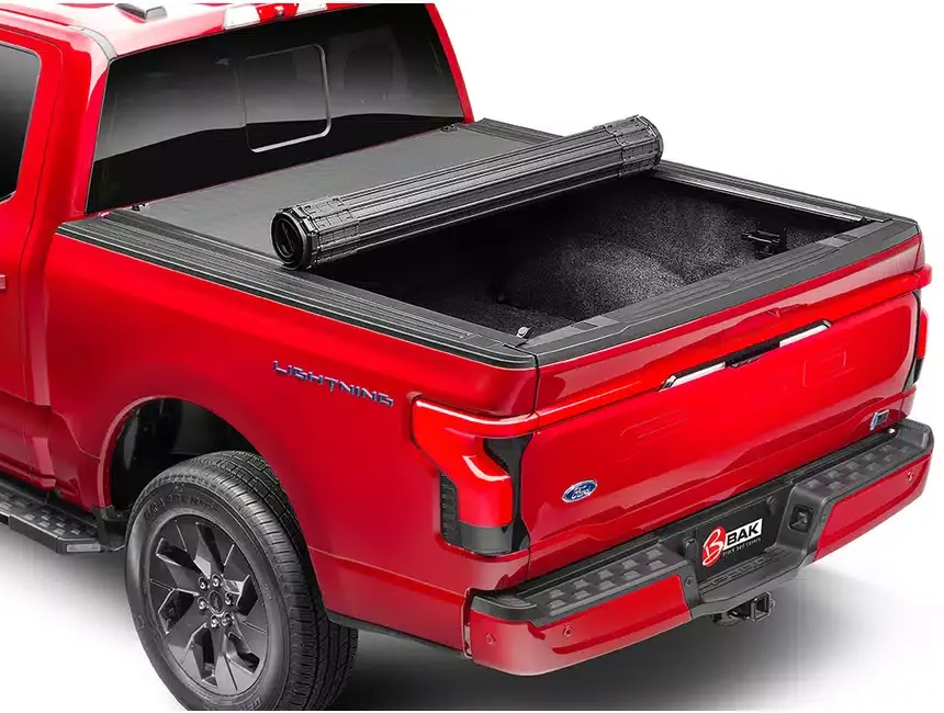 A pickup truck with a hard rolling bed cover